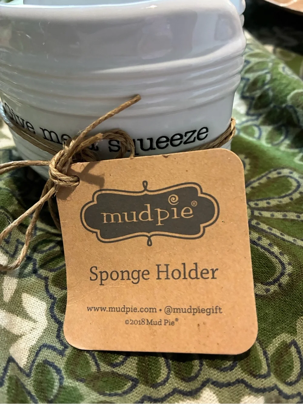 Mudpie “Give Me A Squeeze” Sponge Holder. NWT Dilliards. White w/Black Letters.